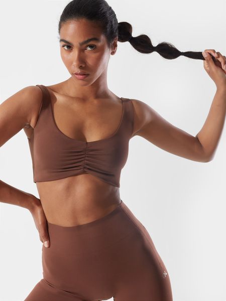 4F Top szybkoschący z materiałów z recyklingu damski 4F x Anna Lewandowska XS. Brązowe topy 4f, xs, bez wzorów, z dzianiny, sportowe, bez kołnierzyka, bez ramiączek. W wyprzedaży za 59.99 zł.