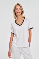 Bluzka z bawełny biała. Białe bluzki MOODO, l, bez wzorów, z bawełny, bez kołnierzyka, bez ramiączek. Za 54.99 zł.
