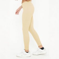 Legginsy do treningu BURNER damskie. Brązowe legginsy LEGEA, bez wzorów, z elastanu, sportowe. W wyprzedaży za 106.00 zł.