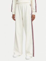 Tommy Hilfiger Spodnie dresowe UW0UW06628 Kremowy Wide Leg. Białe spodnie dresowe Tommy Hilfiger, bez wzorów, z bawełny. Za 329.99 zł.