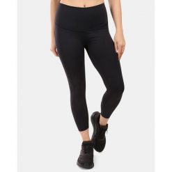 Damskie legginsy fitness Kilpi RIVIAN-W z funkcją OPTI-DRY. Czarne legginsy Kilpi, bez wzorów, sportowe. Za 153.53 zł.
