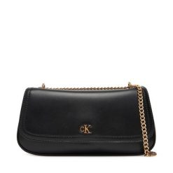 Torebka Calvin Klein. Czarne kopertówki Calvin Klein, bez wzorów, wizytowe, bez dodatków. Za 369.99 zł.