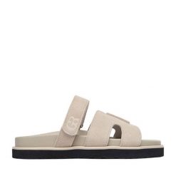 Klapki GINO ROSSI. Białe klapki Gino Rossi, bez wzorów, bez obcasa, bez zapięcia. Za 179.99 zł.