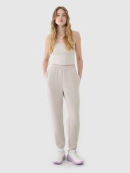 4F Spodnie dresowe joggery z modalem damskie - beżowe XL. Brązowe spodnie dresowe 4f, bez wzorów, z dresówki, sportowe. W wyprzedaży za 139.99 zł.