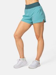 KARI TRAA Szorty sportowe "Ava" w kolorze turkusowym rozmiar: L. Niebieskie szorty sportowe Kari Traa, bez wzorów, z podwyższonym stanem, outdoorowe. Za 108.99 zł.