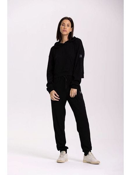 Onamaste Bluza "Mika" w kolorze czarnym rozmiar: S/M. Czarne bluzy Onamaste, m, bez wzorów, prążkowane, bez ramiączek, z kapturem. Za 210.32 zł.
