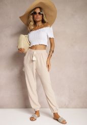 Beżowe Spodnie Cargo High Waist Wykończone Gumką w Pasie Nellindra. Brązowe jeansy Renee, bez wzorów, z jeansu, eleganckie, z podwyższonym stanem. W wyprzedaży za 29.99 zł.