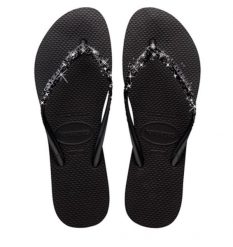 Klapki Havaianas Model Slim Glitter Ii Kolor Czarny. Czarne klapki Havaianas, bez wzorów, z gumy, casualowe, bez obcasa, bez zapięcia. Za 158.90 zł.