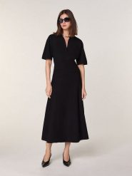 Rodier Wełniana sukienka w kolorze czarnym rozmiar: S. Czarne sukienki Rodier, s, bez wzorów, z wełny, bez kołnierzyka, bez ramiączek, midi. Za 478.99 zł.