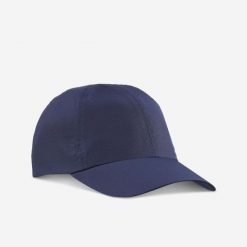 Czapka trekkingowa z daszkiem Forclaz Travel 100. Niebieskie czapki z daszkiem FORCLAZ, bez wzorów, z materiału, sportowe. Za 21.99 zł.