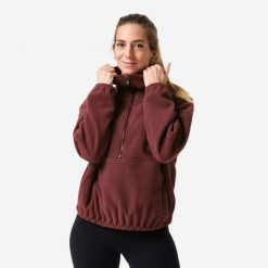 Bluza do jogi damska Domyos polar. Fioletowe bluzy z kapturem DOMYOS, l, bez wzorów, z materiału, bez kaptura, na fitness i siłownię. Za 119.99 zł.