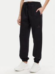 Adidas Spodnie dresowe ALL SZN Fleece IW1024 Czarny Loose Fit. Czarne spodnie dresowe adidas, bez wzorów, z bawełny. Za 149.99 zł.