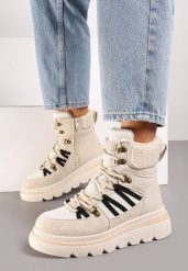 Beżowe Traperki na Grubej Podeszwie Ozdobione Futerkiem Linthira. Brązowe traperki Born2be, bez wzorów, z futra, eleganckie, bez obcasa, bez zapięcia. Za 99.99 zł.