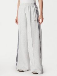 Adidas Spodnie dresowe Spacer HY8044 Szary jasny Wide Leg. Szare spodnie dresowe adidas, bez wzorów, z bawełny. Za 298.99 zł.