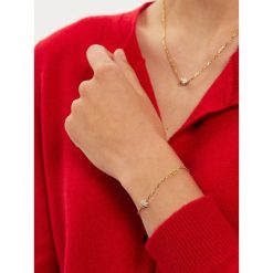 Bransoletka Guess. Żółte bransoletki Guess, złote. Za 169.99 zł.