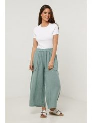 Lin Passion Lniane spodnie w kolorze zielonym rozmiar: 36/38. Zielone spodnie materiałowe Lin Passion, bez wzorów, ze lnu, klasyczne, z standardowym stanem. Za 121.99 zł.