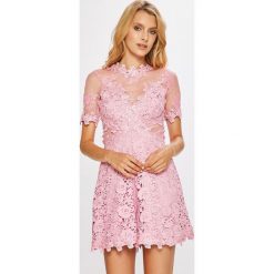 Guess Jeans - Kombinezon Lara. Kombinezony marki TRIBORD. W wyprzedaży za 479.90 zł.