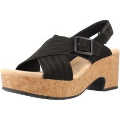 Sandały CLARKS NERISA WEST Czarny. Czarne sandały Clarks, bez wzorów, ze skóry, bez obcasa, bez zapięcia. Za 194.99 zł.