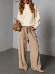 Milan Kiss Spodnie w kolorze beżowym rozmiar: S. Brązowe spodnie materiałowe Milan Kiss, bez wzorów, z materiału. Za 208.99 zł.