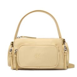 Torebka Calvin Klein. Żółte torebki klasyczne Calvin Klein, bez wzorów, z nylonu, klasyczne, bez dodatków. Za 449.99 zł.
