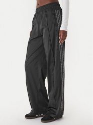 Adidas Spodnie dresowe Pearl Firebird KC7863 Czarny Loose Fit. Czarne spodnie dresowe adidas, bez wzorów, z dresówki. Za 349.99 zł.