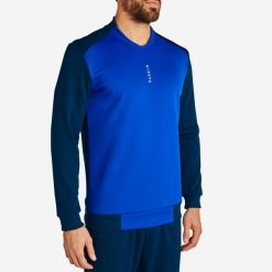 Bluza piłkarska dla dorosłych Kipsta T100. Niebieskie bluzy KIPSTA, xl, bez wzorów, z elastanu, bez kaptura, na fitness i siłownię. Za 69.99 zł.