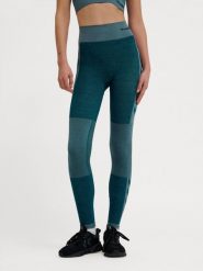 Damskie legginsy bezszwowe z wysokim stanem Hummel Clea. Niebieskie legginsy Hummel, bez wzorów, z dzianiny, klasyczne. Za 169.95 zł.