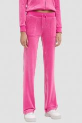 JUICY COUTURE Różowe damskie spodnie welurowe Del Ray Pocket Pant, Rozmiar S. Czerwone spodnie dresowe Juicy Couture, bez wzorów, z dresówki. Za 499.99 zł.