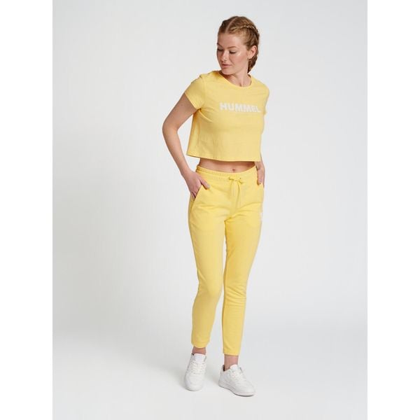 Damska koszulka crop top Hummel Legacy. Żółte topy Hummel, l, bez wzorów, sportowe, bez kołnierzyka, bez ramiączek. Za 94.00 zł.