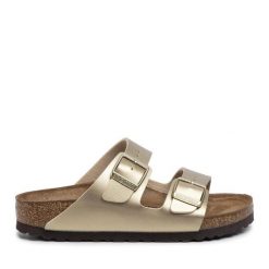 Klapki Birkenstock. Żółte klapki Birkenstock, bez wzorów, bez obcasa, bez zapięcia. Za 399.99 zł.