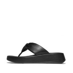 Sandały damskie FitFlop F-Mode Knot Soft-Leather Flatform Toe-Post. Czarne sandały FIT FLOP, bez wzorów, z materiału, eleganckie, bez obcasa, bez zapięcia. Za 647.50 zł.