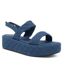Sandały JENNY. Niebieskie sandały Jenny, bez wzorów, bez obcasa, na koturnie, bez zapięcia. Za 129.99 zł.