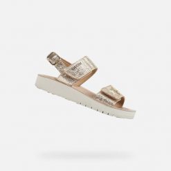 Sandały GEOX J SANDAL COSTAREI GI Złoty. Żółte sandały Geox, bez wzorów, ze skóry, bez obcasa, bez zapięcia. Za 246.15 zł.