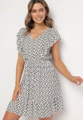 Biała Rozkloszowana Sukienka z Bawełny w Kwiaty z Guzikami Ronelle. Białe sukienki Born2be, na co dzień, l, bez wzorów, z bawełny, eleganckie, bez kołnierzyka, bez ramiączek, mini, proste. W wyprzedaży za 38.24 zł.
