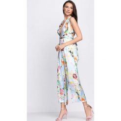 Niebieski Kombinezon Secret Garden. Kombinezony marki Born2be. Za 129.99 zł.