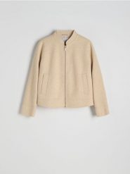 Krótka flauszowa kurtka oversize - kremowy. Białe kurtki Reserved, l, bez wzorów, z tkaniny, bez kaptura. Za 159.99 zł.