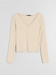 Bluzka z długim rękawem i koronką przy dekolcie - żółty. Żółte bluzki Sinsay, l, bez wzorów, z koronki, bez kołnierzyka, bez ramiączek. Za 25.99 zł.