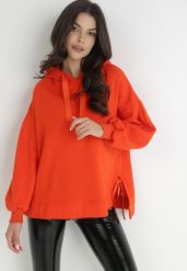 Pomarańczowa Bluza Oversize z Kapturem Kulsum. Brązowe bluzy Born2be, m, bez wzorów, z bawełny, casualowe, bez ramiączek, z kapturem. Za 99.99 zł.