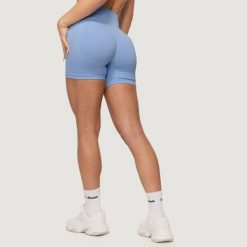 Szorty damskie fitness bezszwowe slim Sky NEO. Niebieskie szorty sportowe GYMBEAM, bez wzorów, z materiału, do biegania. Za 83.90 zł.