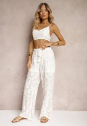Białe Spodnie High Waist o Ażurowym Wykończeniu z Gumką w Talii Gralefia. Białe jeansy Renee, w ażurowe wzory, z jeansu, z podwyższonym stanem. W wyprzedaży za 107.99 zł.
