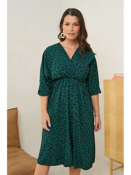 Curvy Lady Sukienka w kolorze ciemnozielonym rozmiar: 40/42. Zielone sukienki Curvy Lady, bez wzorów, z wiskozy, klasyczne, bez kołnierzyka, bez ramiączek, midi. Za 87.81 zł.