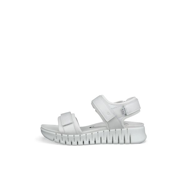 Damskie sandały na koturnie Ecco Gruuv. Białe sandały ECCO, bez wzorów, z materiału, eleganckie, bez obcasa, na koturnie, bez zapięcia. Za 492.00 zł.