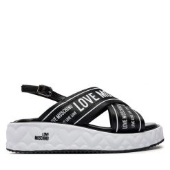 Sandały LOVE MOSCHINO. Czarne sandały Love Moschino, bez wzorów, bez obcasa, na płaskiej podeszwie, bez zapięcia. Za 1,259.00 zł.