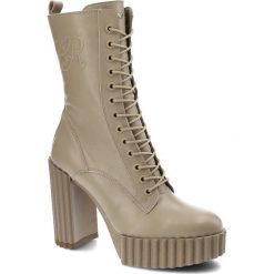 Beżowe Botki Carinii Eleganckie Skórzane Buty Na Słupku. Brązowe botki Carinii, bez wzorów, ze skóry, eleganckie, bez obcasa, na słupku, bez zapięcia. Za 609.00 zł.