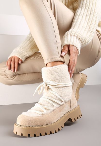 Beżowe Śniegowce na Grubej Podeszwie z Cyrkoniami i Futerkową Wstawką Rianaella. Brązowe śniegowce Born2be, z aplikacjami, bez zapięcia. Za 119.99 zł.