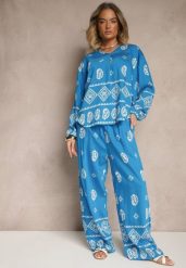 Niebieski Komplet w Stylu Etno Spodnie z Gumką w Pasie i Bluzka Oversize Eviralyn. Niebieskie bluzki Renee, bez wzorów, eleganckie, bez kołnierzyka, bez ramiączek. W wyprzedaży za 95.99 zł.