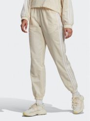 Adidas Spodnie dresowe adicolor lassics Poplin Track HL9309 Écru Regular Fit. Spodnie dresowe adidas, bez wzorów, z bawełny. Za 189.99 zł.
