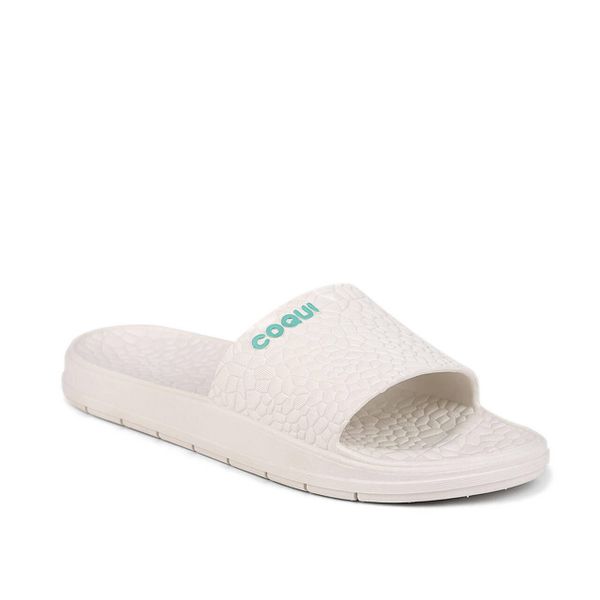 Klapki basenowe damskie Coqui Rune. Białe klapki Coqui, bez wzorów, sportowe, bez obcasa, bez zapięcia. Za 125.99 zł.