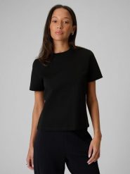 4F T-shirt regular gładki damski - czarny XL. Czarne t-shirty 4f, uniwersalny, bez wzorów, z materiału, bez kołnierzyka, bez ramiączek. Za 79.99 zł.