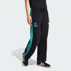 Spodnie Mercedes - Amg Petronas Formula 1 Team Dna. Czarne spodnie dresowe adidas, bez wzorów, długie. Za 259.00 zł.
